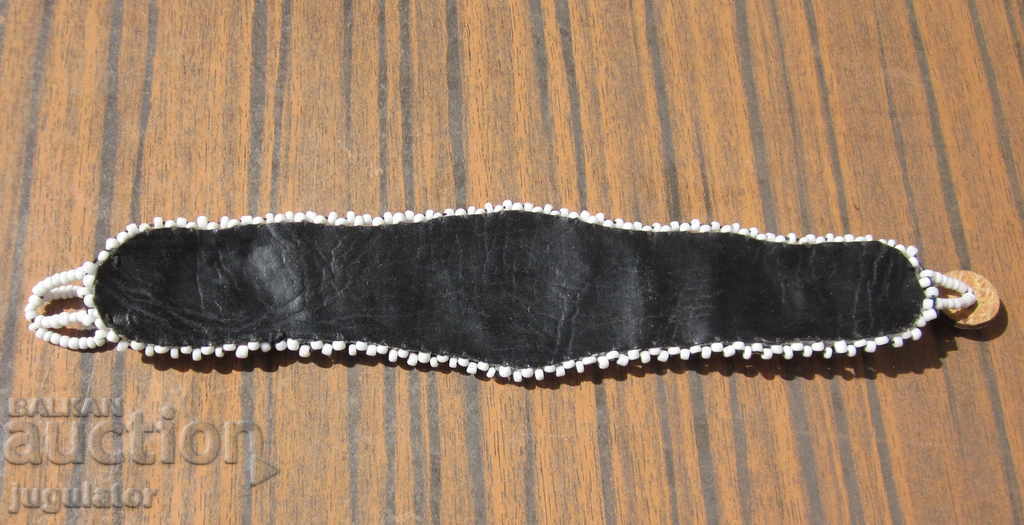 Delivery of an old antique Bulgarian folklore bracelet of beads and mother of pearl