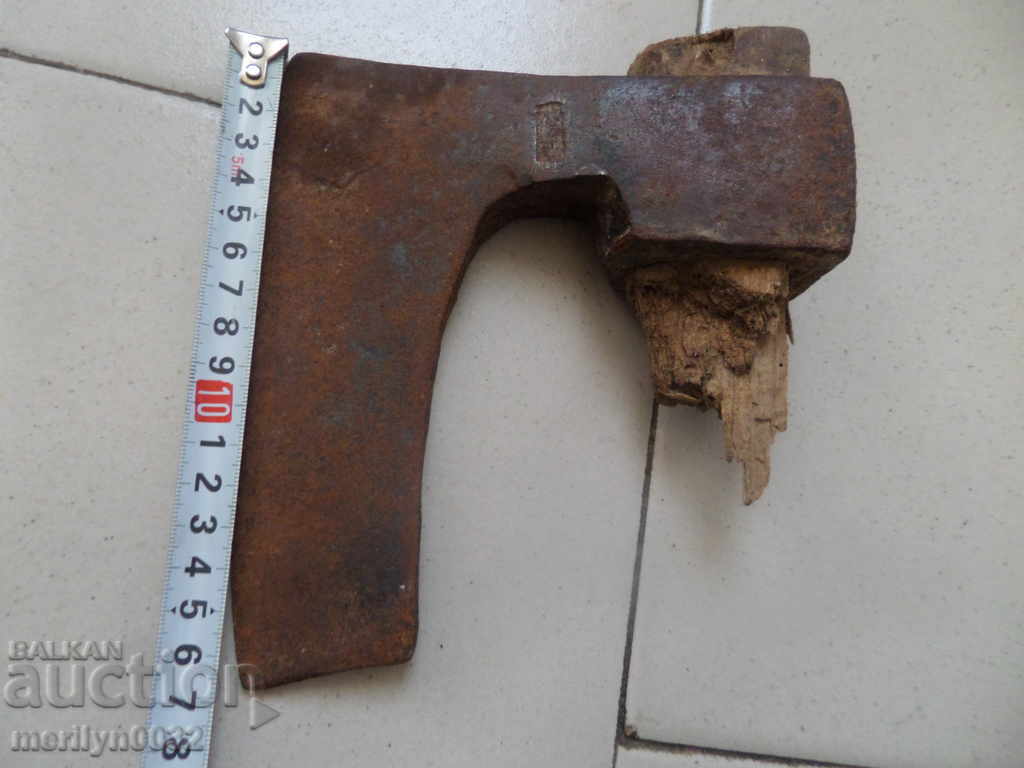 Old ax with seal marking tool wrought iron