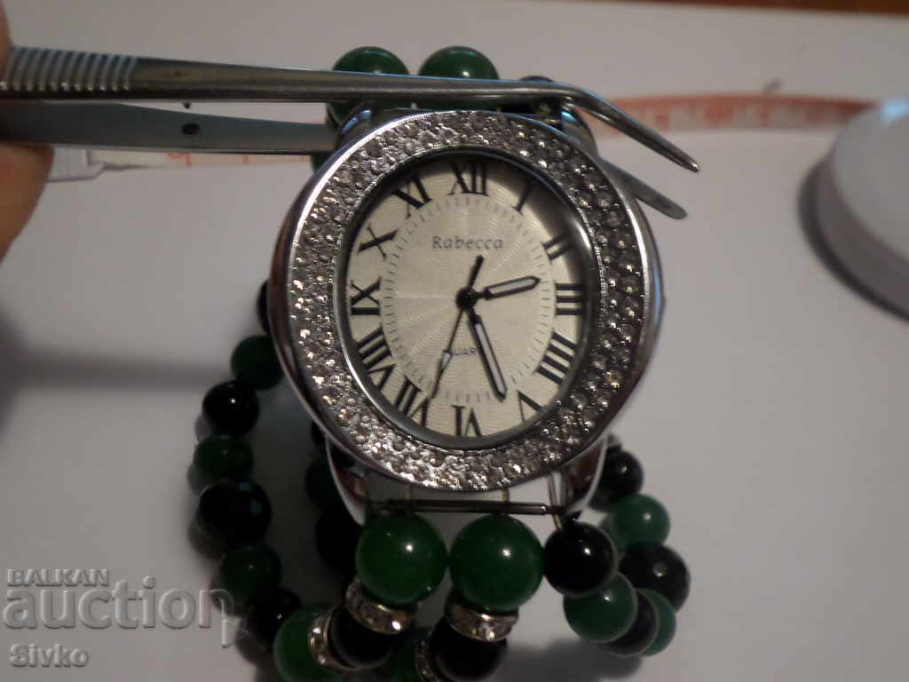 Ladies' watch, chain, sapphire and emerald Ladies' watch, chain, sapphire and emerald