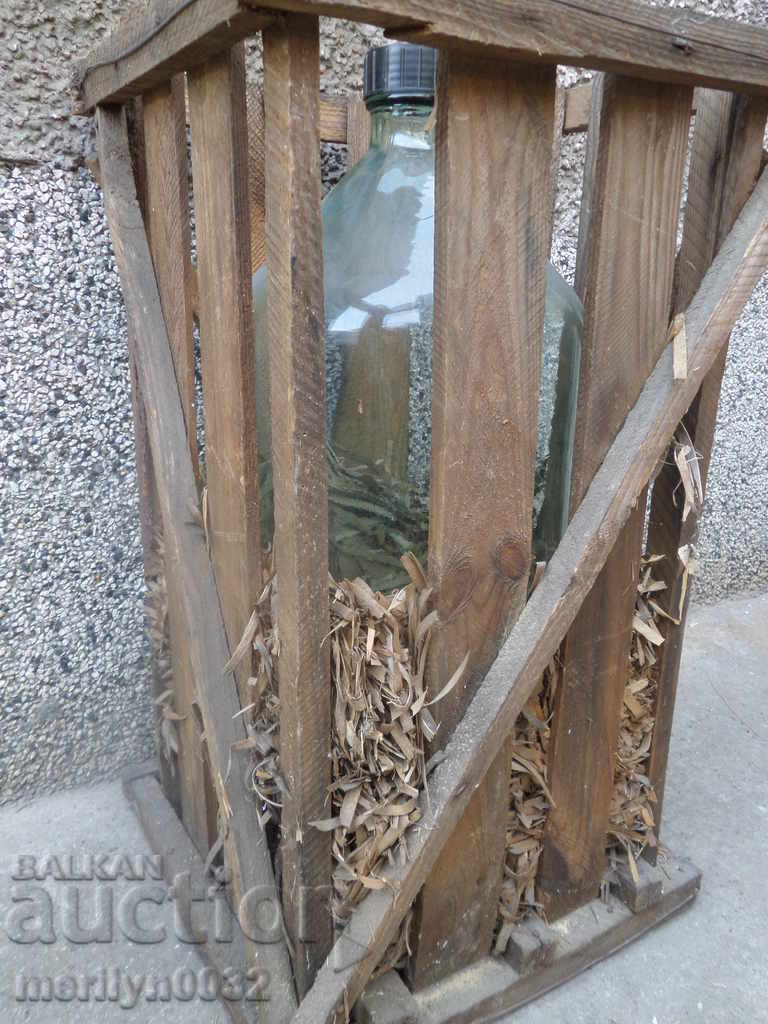 Delivery of A glass bottle with a cartoon bottle of a bottle of 20 liters of brandy Delivery of A glass bottle with a cartoon bottle of a bottle of 20 liters of brandy