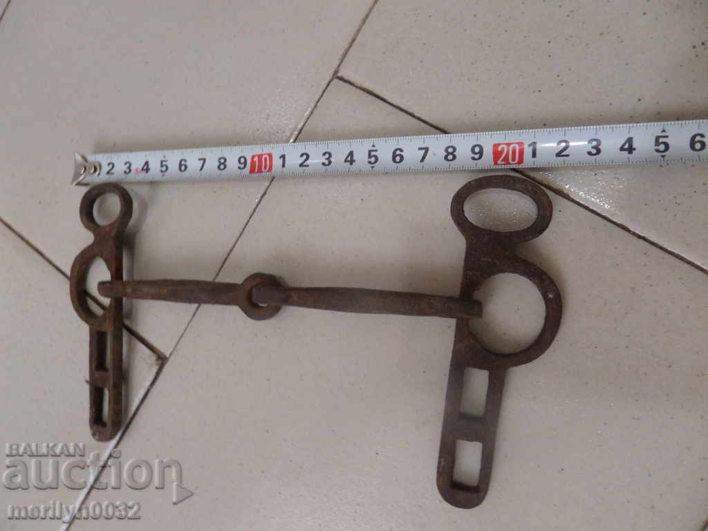 Delivery of An old forged bridle reins wrought iron, a harness Delivery of An old forged bridle reins wrought iron, a harness