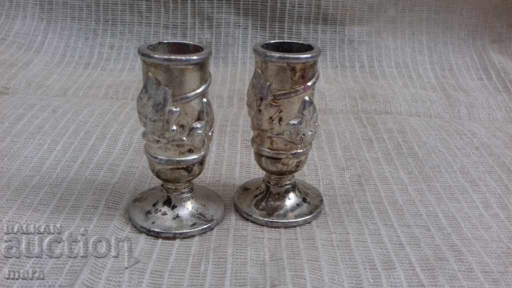 A pair of small candlesticks.