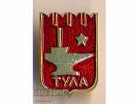Toula badge