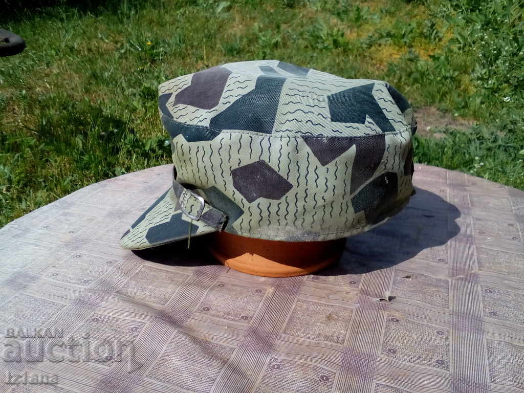 Livrarea Pălărie de camuflaj, camuflaj