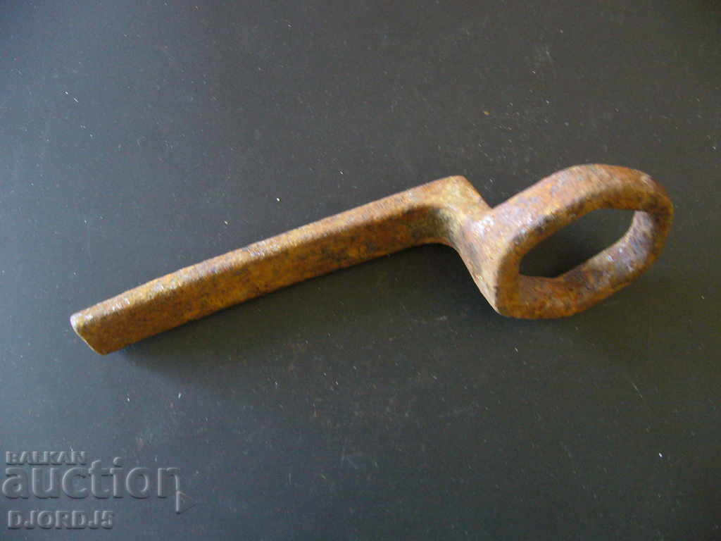 Old forged wrench for wagon