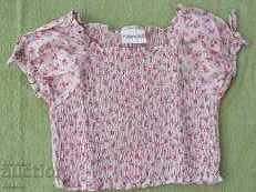 Blouse for girl with bouffant sleeve, size 110