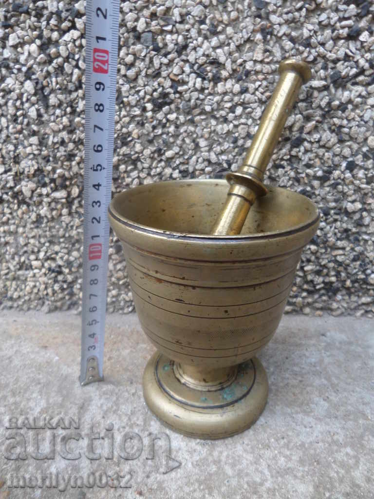 Delivery of Old bronze mortar with hammer, mortar Delivery of Old bronze mortar with hammer, mortar