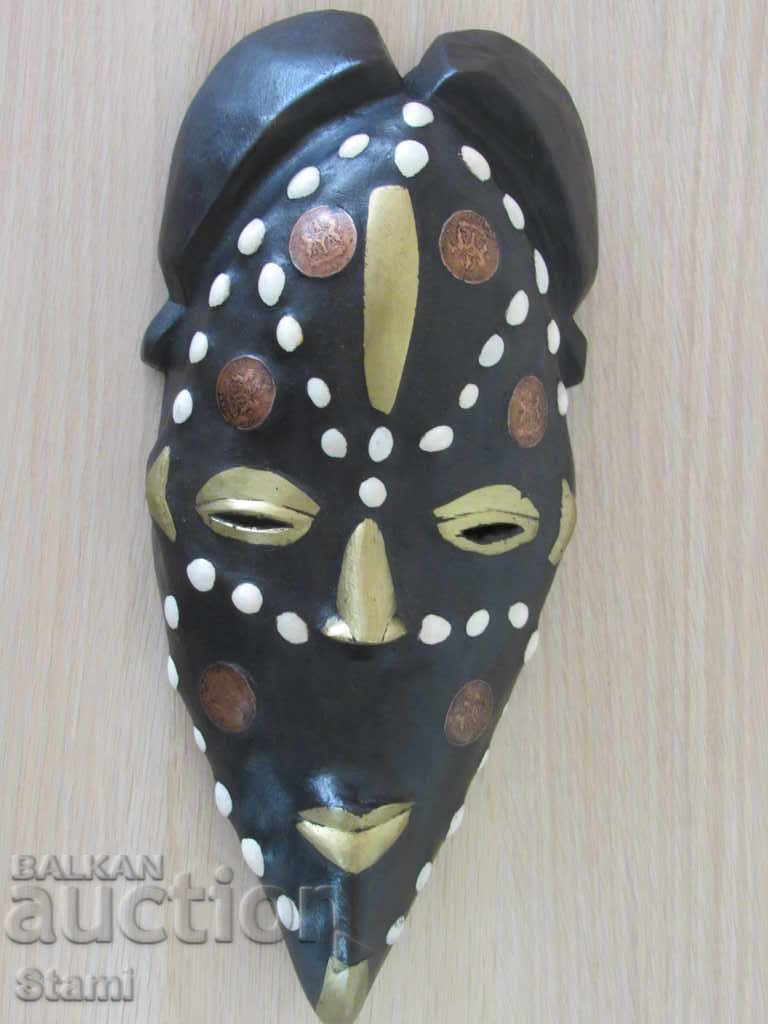 Αφρικανική μάσκα με κόμπο και μπρούτζο
