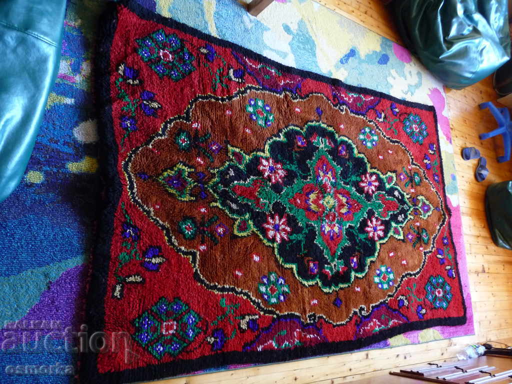 Delivery of Old rusty carpet ruby