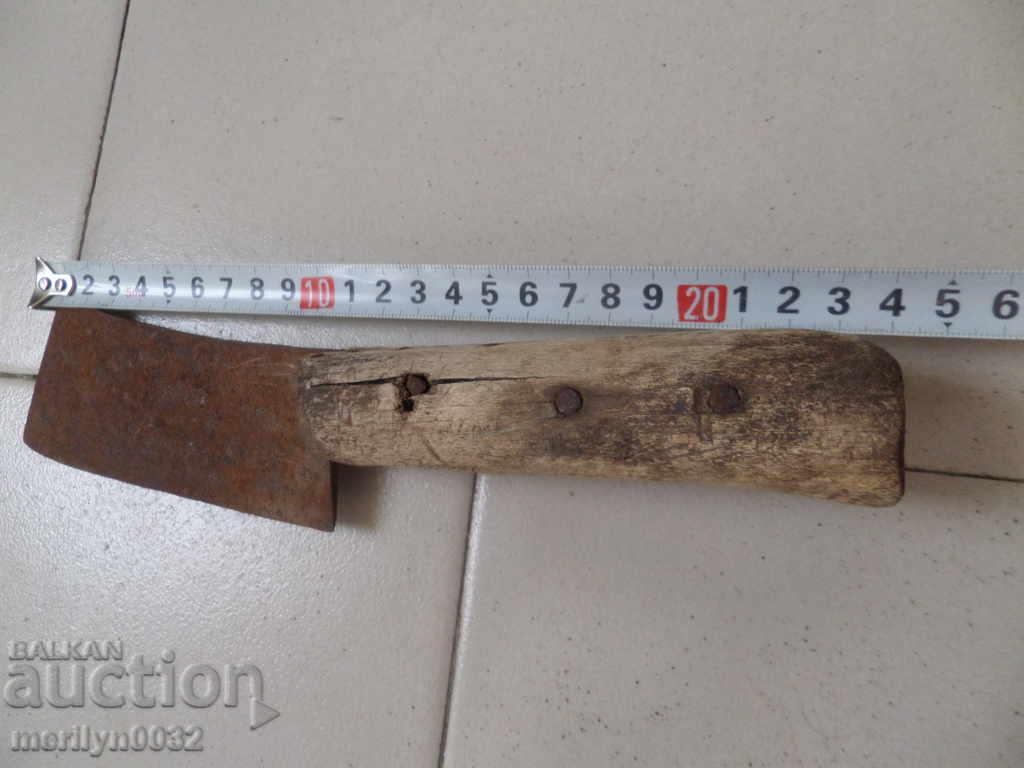 Auction An old hand forged saber, ax, pole, knife Auction An old hand forged saber, ax, pole, knife