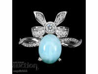 SOLD SILVER RING WITH NATURAL LARIMAR AND CYCLONS