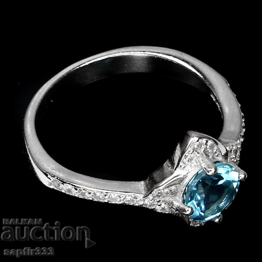 Auction  SOLD SILVER RING WITH NATURAL HEAT AND CYCLONS