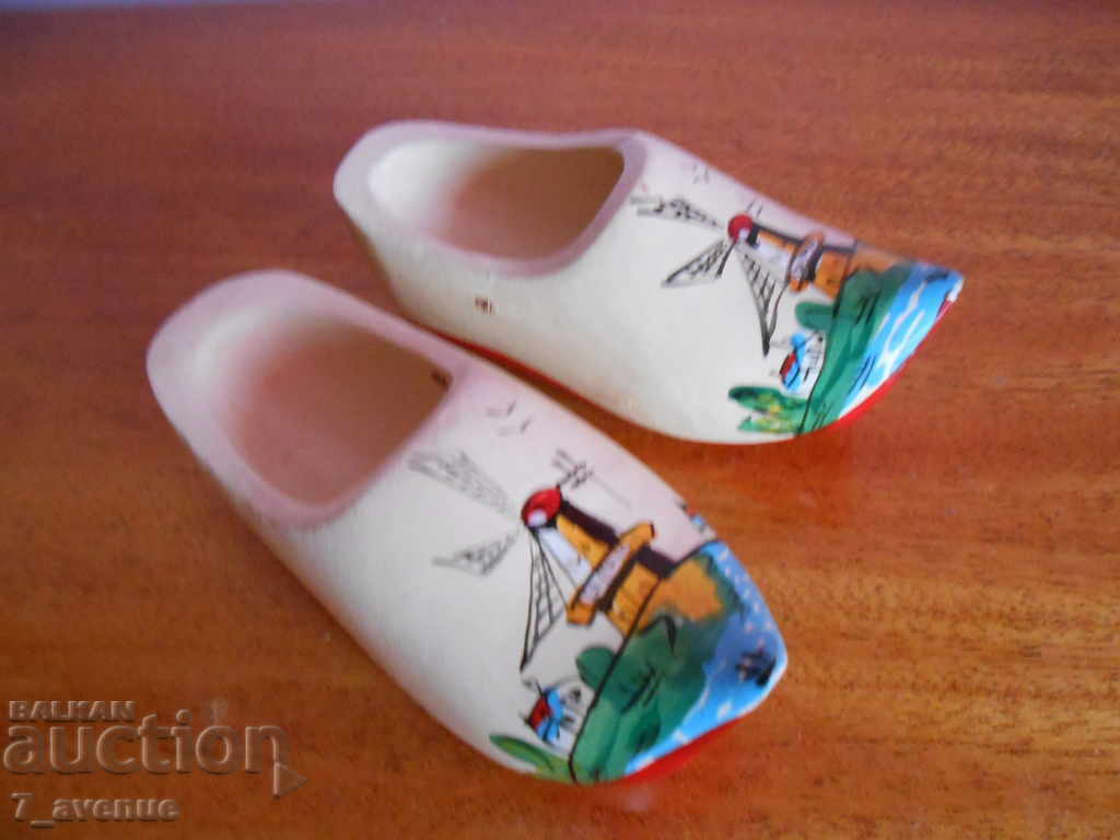 Dutch shoes:) of wood, painted