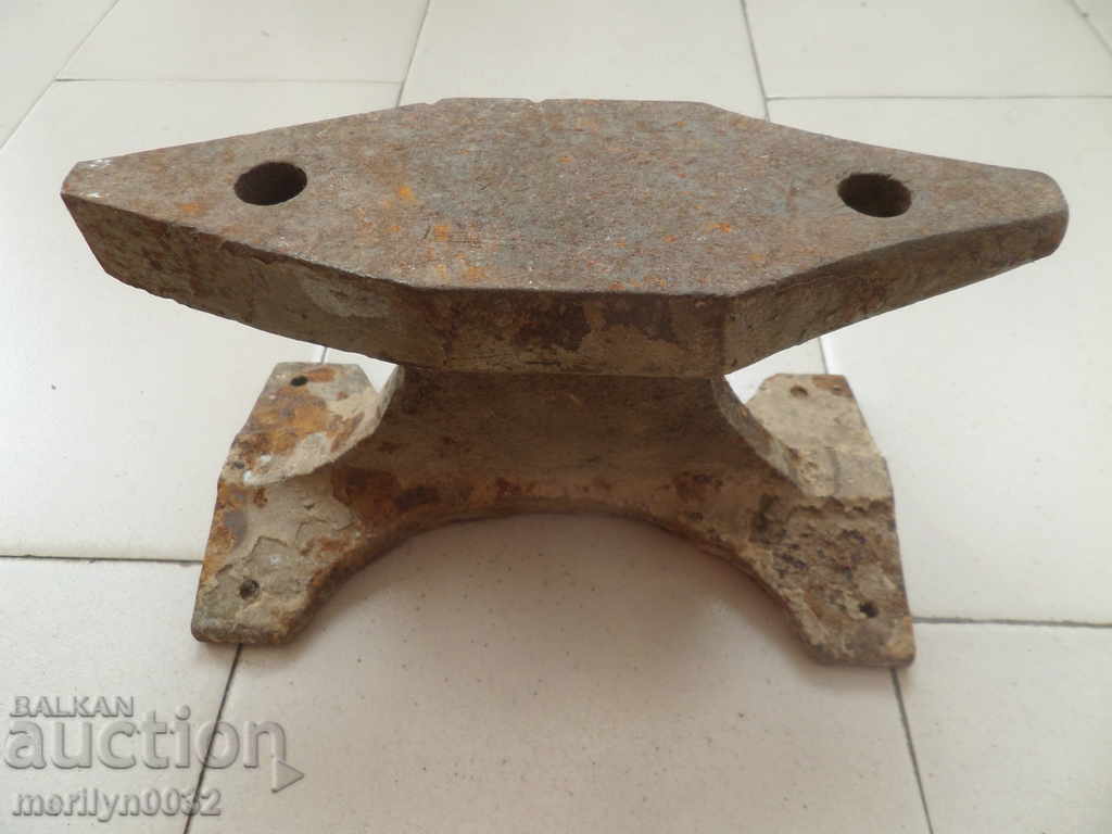 An old anvil, a forging tool, a tool