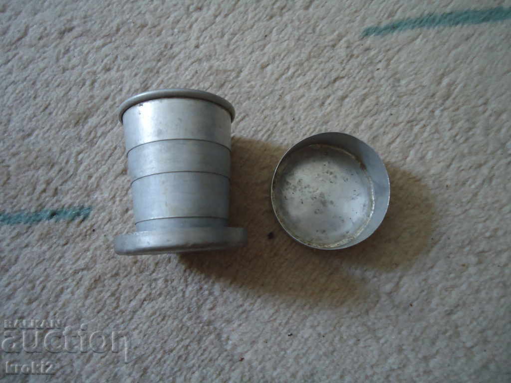 Old aluminum folding cup