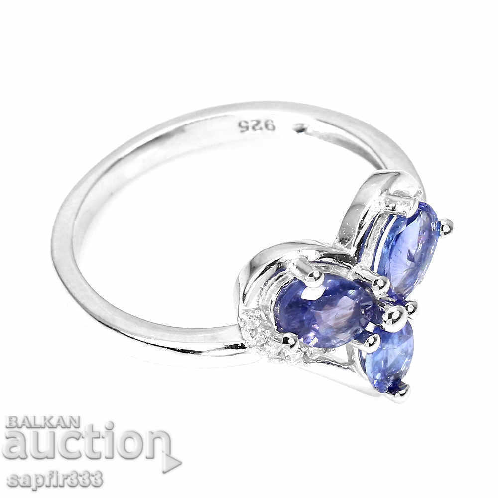 Auction BEAUTIFUL HEART RING WITH NATURAL TANZANITES AND ZIRCONIA Auction BEAUTIFUL HEART RING WITH NATURAL TANZANITES AND ZIRCONIA