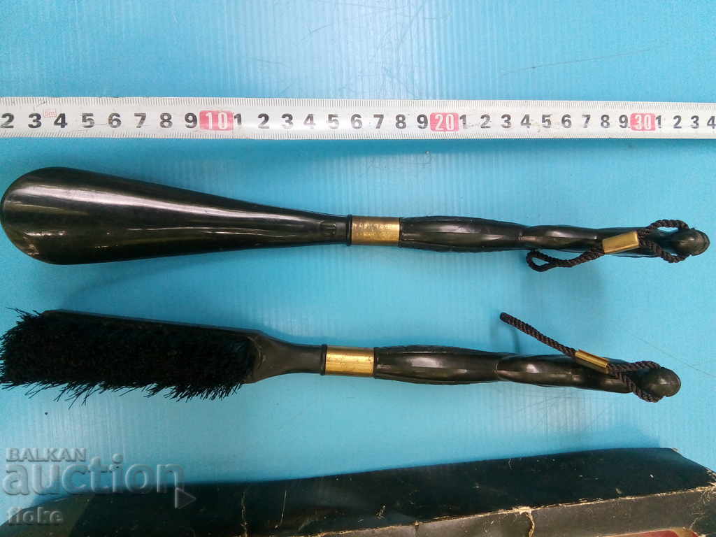 Auction An old jacket and a clothes brush Auction An old jacket and a clothes brush