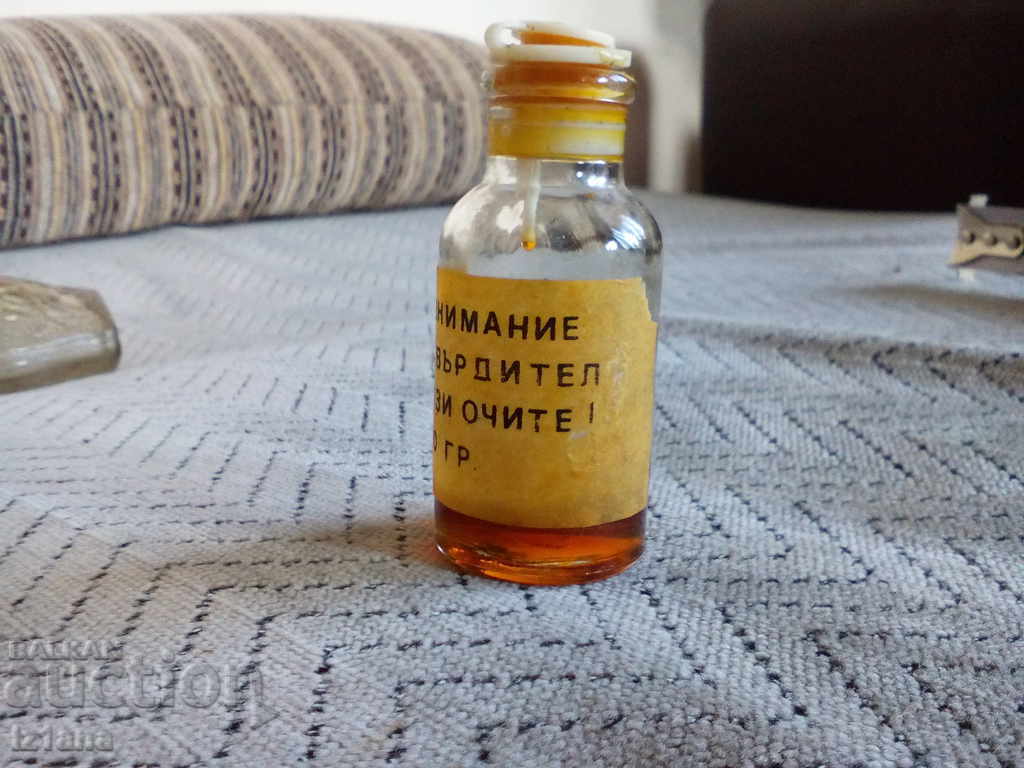 Auction Old bottle of hardener Auction Old bottle of hardener