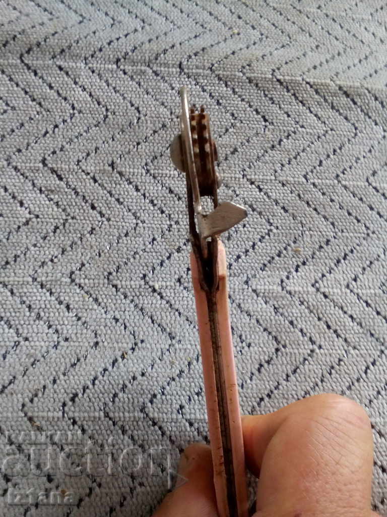 Delivery of An old bottle opener