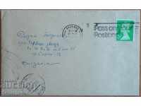Traveled envelope with a letter from England from the 80s