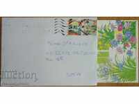 Traveled envelope with postcard from Italy, 1980s