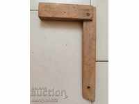 Old carpentry angle wooden tool