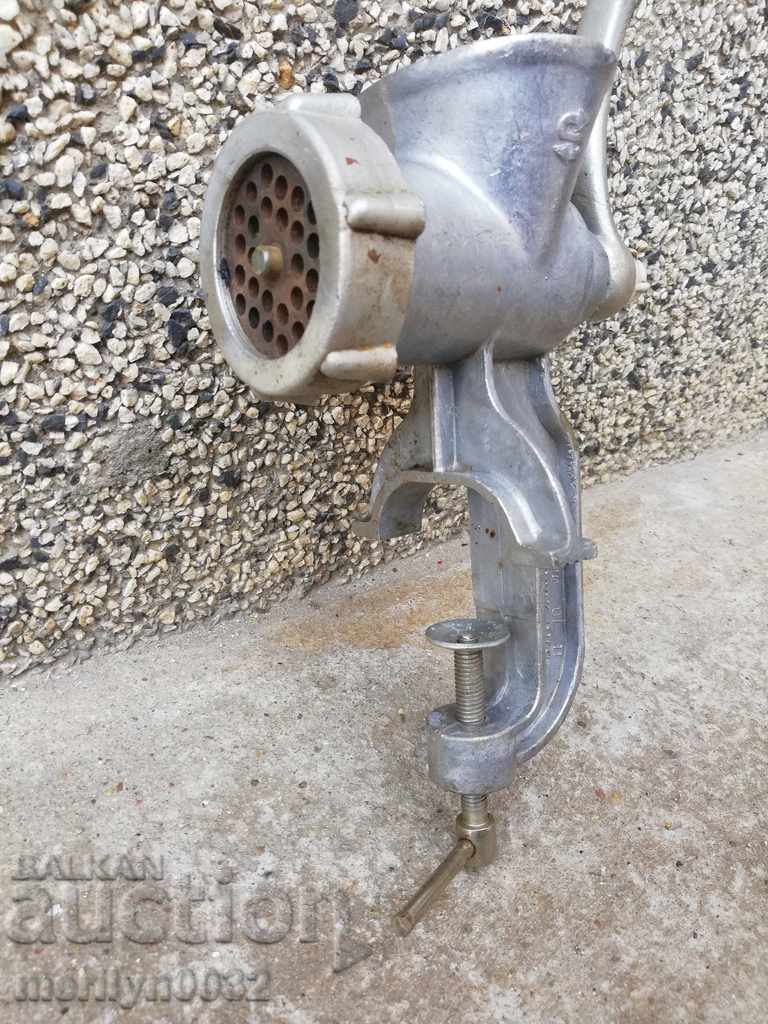 Delivery of An old meat grinder, a milling machine