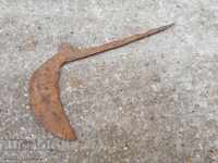 Old handmade hammer, wrought iron mignon