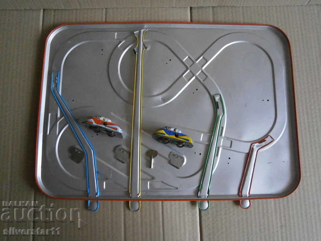 a metal track with two metal trolleys and a key - 5 a metal track with two metal trolleys and a key - 5