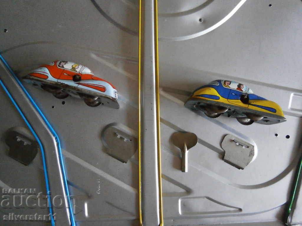 a metal track with two metal trolleys and a key - 6 a metal track with two metal trolleys and a key - 6