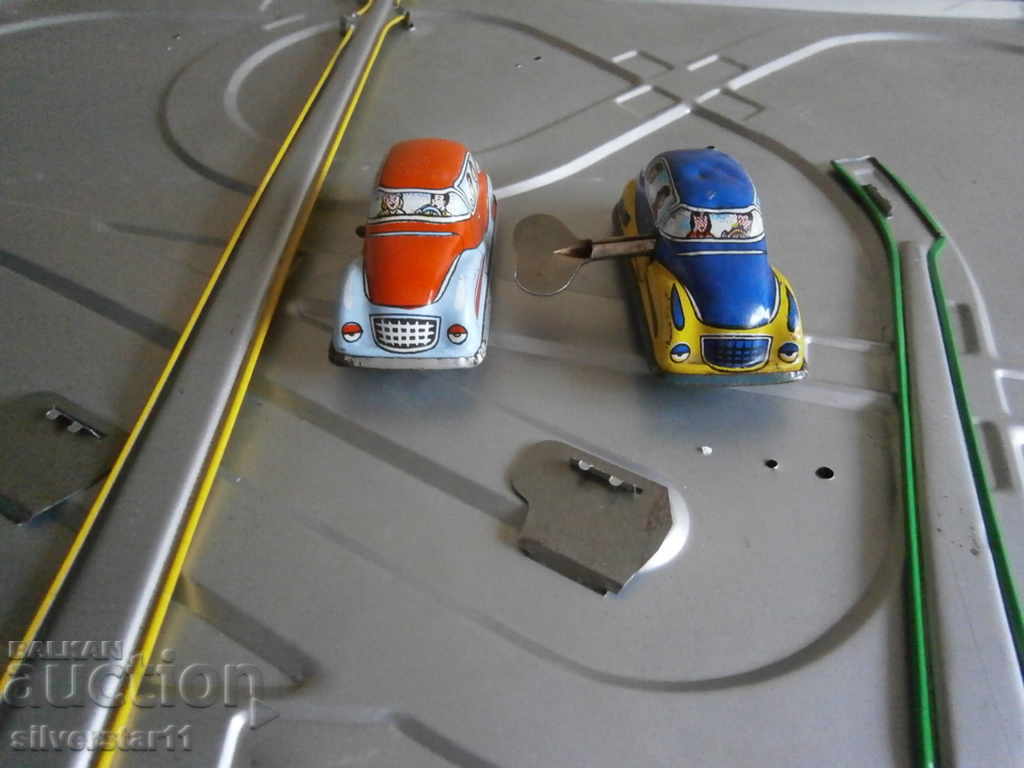 a metal track with two metal trolleys and a key - 7 a metal track with two metal trolleys and a key - 7