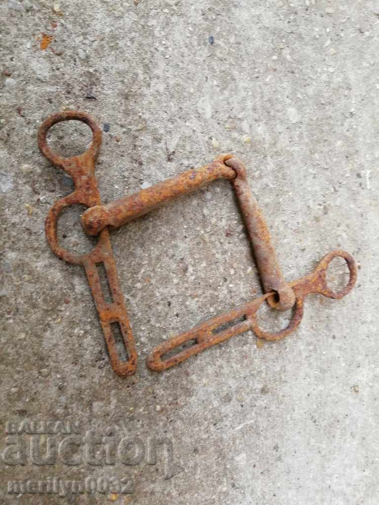 Auction An old forged bridle reins wrought iron, a harness Auction An old forged bridle reins wrought iron, a harness