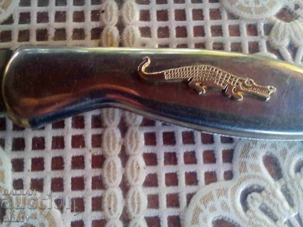 Auction  An old knife.