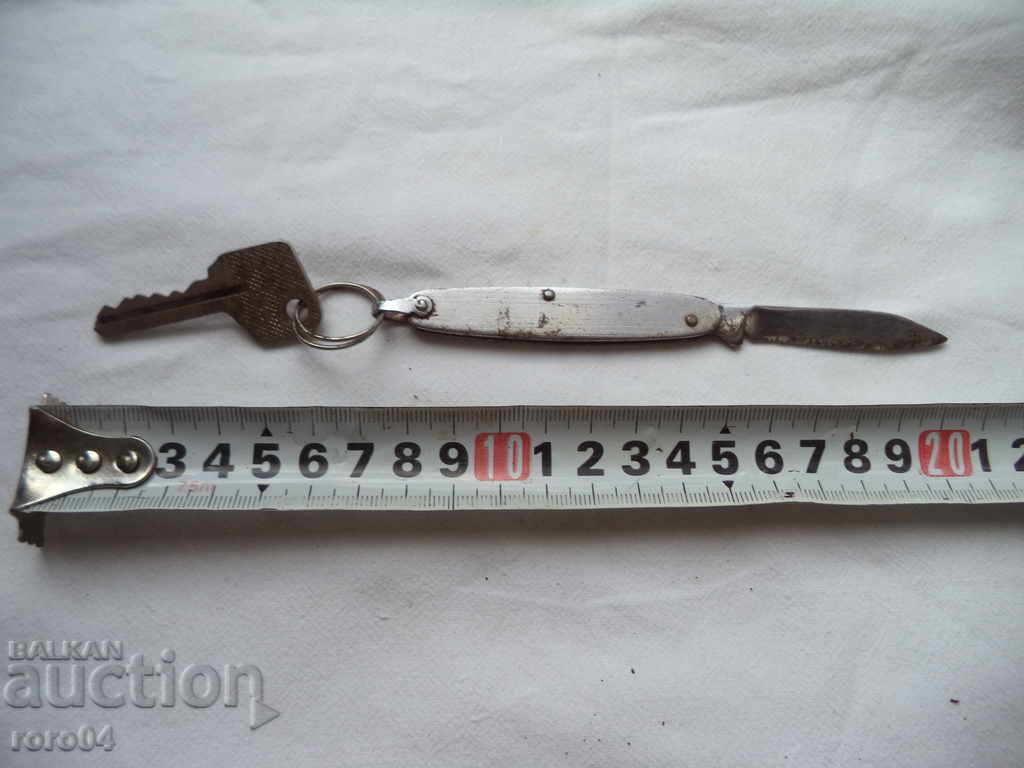 Delivery of AN OLD BUTTER WITH LADDER KEY