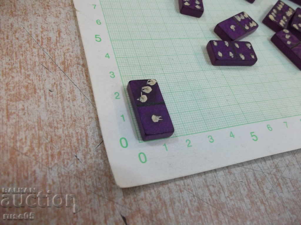 Delivery of Domino a little wooden