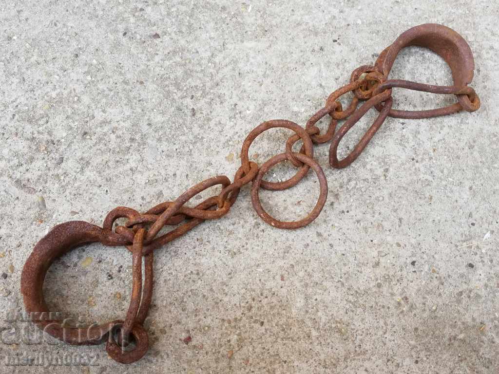 Hand forged buckles, shackles, chain, wrought iron Hand forged buckles, shackles, chain, wrought iron