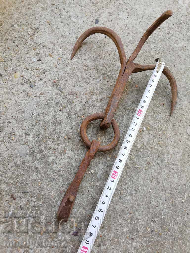 Delivery of Old forged hook, quail, anchored iron