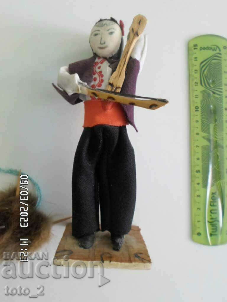 Auction OLD HANDMADE SOUVENIR "MAN WITH A CUDDLE" Auction OLD HANDMADE SOUVENIR "MAN WITH A CUDDLE"