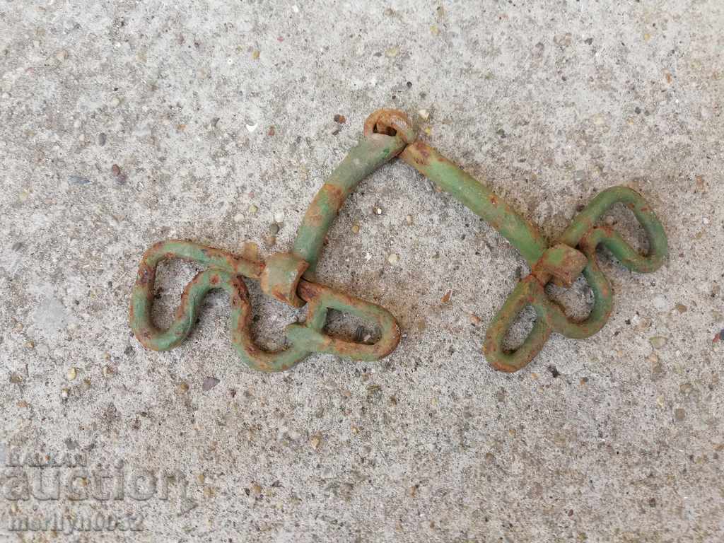 Delivery of An old forged bridle reins wrought iron, a harness Delivery of An old forged bridle reins wrought iron, a harness