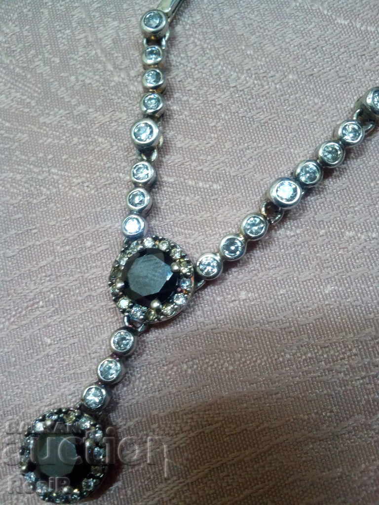 SILVER WHEEL WITH ONYX AND CYCLONS with price 44.00 BGN | € 22.50 SILVER WHEEL WITH ONYX AND CYCLONS with price 44.00 BGN | € 22.50