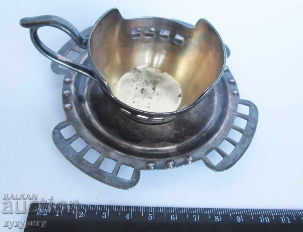 Auction An old silver cup with a dish decorated Art Deco Auction An old silver cup with a dish decorated Art Deco