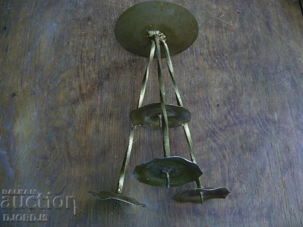 An old metal candleholder with price 6.00 BGN | € 3.07 An old metal candleholder with price 6.00 BGN | € 3.07