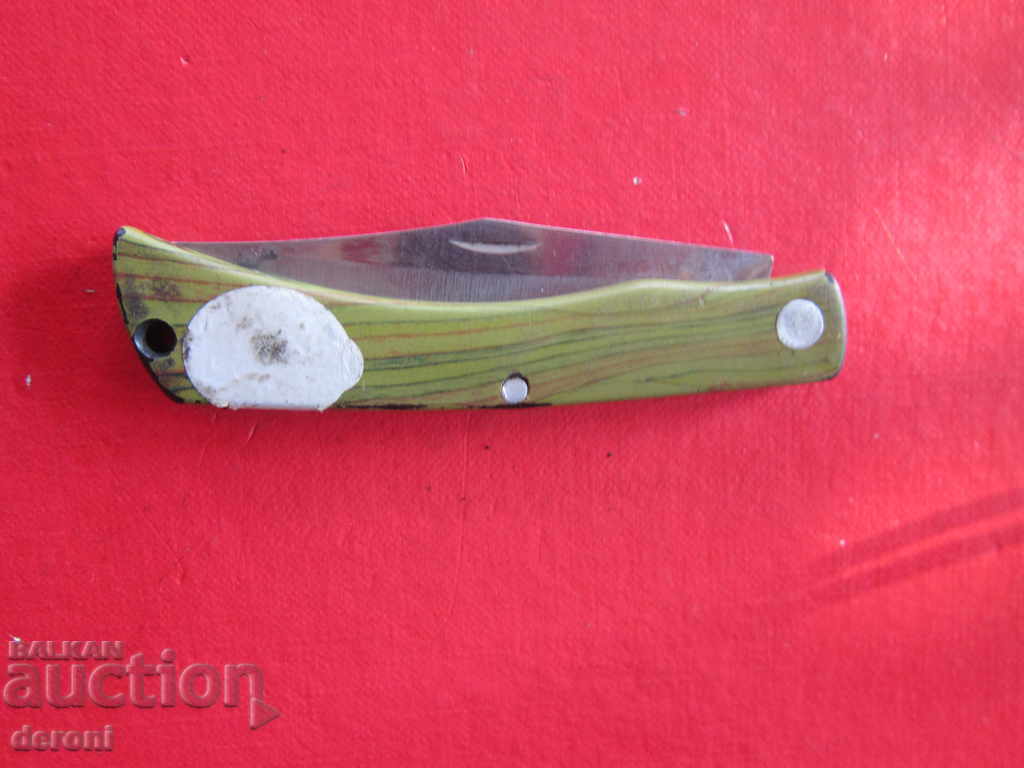 Delivery of An old blade knife Delivery of An old blade knife