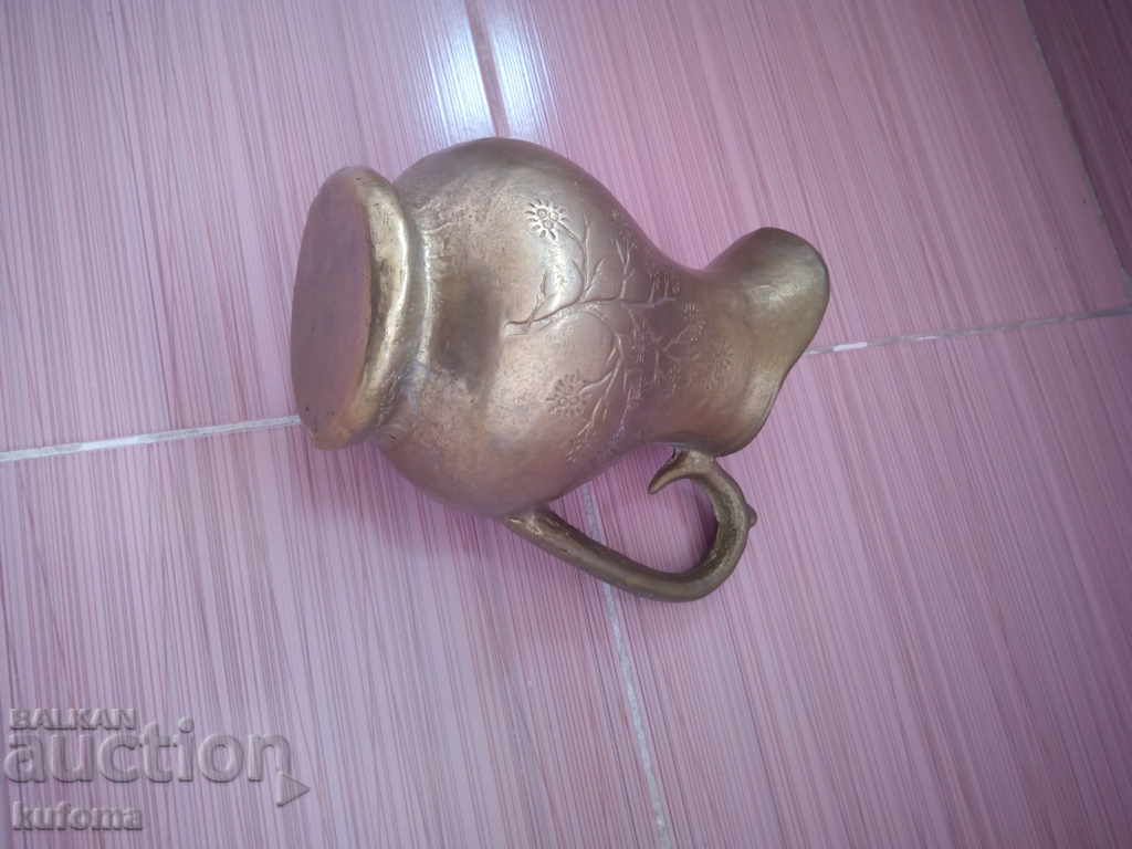 Auction Bronze jug Auction Bronze jug