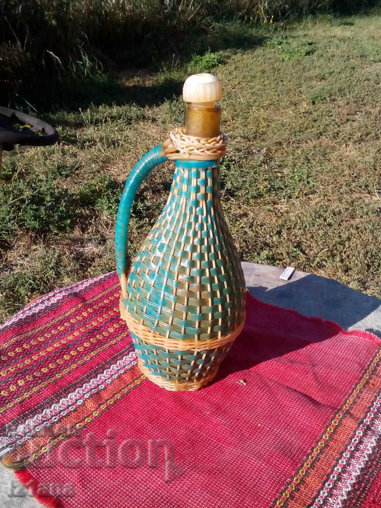 Auction An old knitted bottle, a damagan Auction An old knitted bottle, a damagan