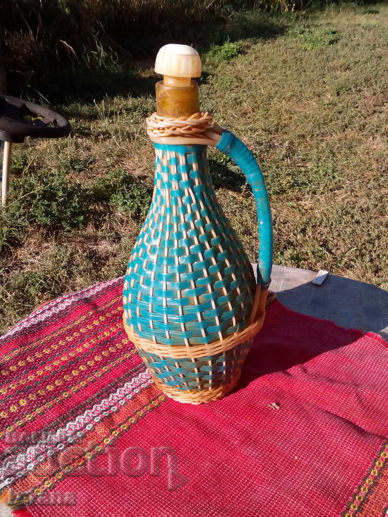 An old knitted bottle, a damagan