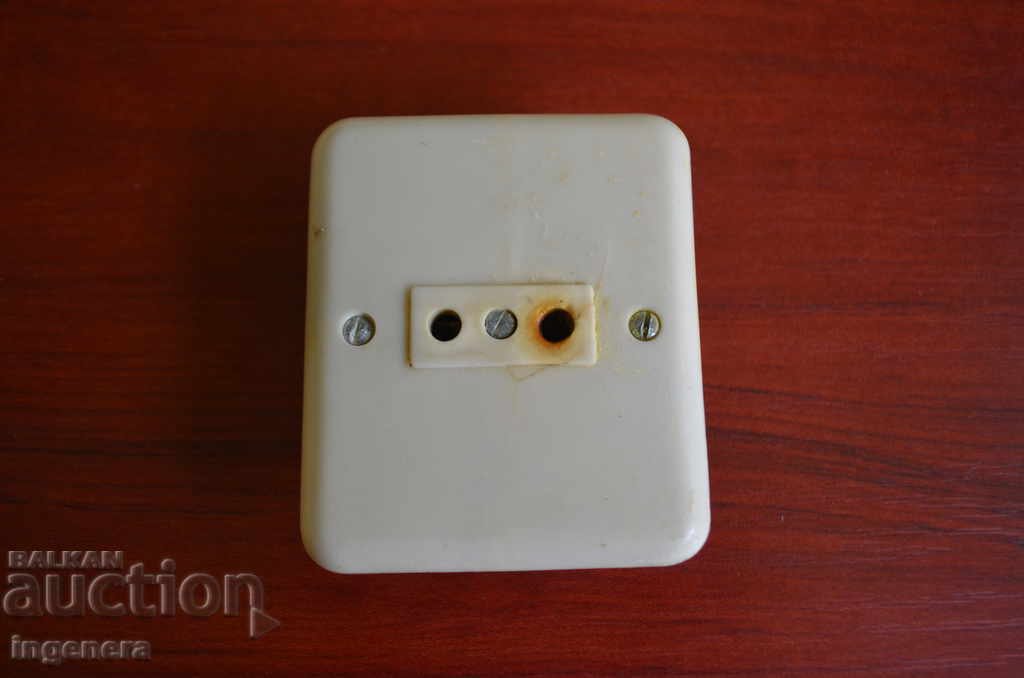 Electrical outlet, old-bakelite and ceramic