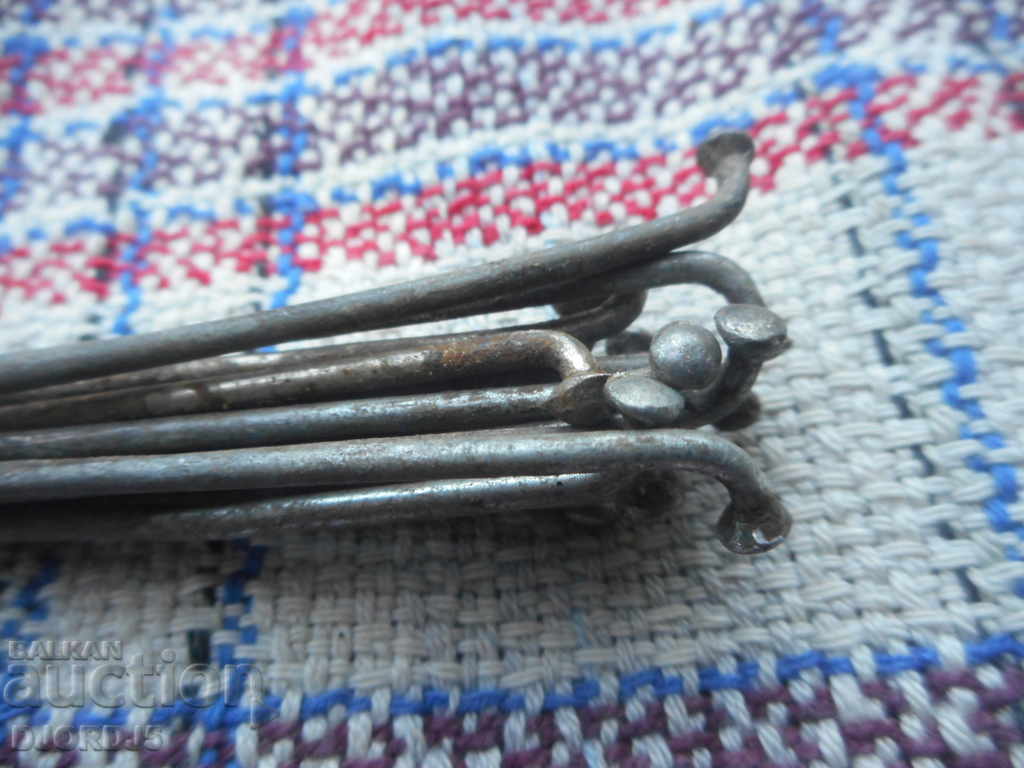 Auction  Spikes for an old wheel, 15 pieces