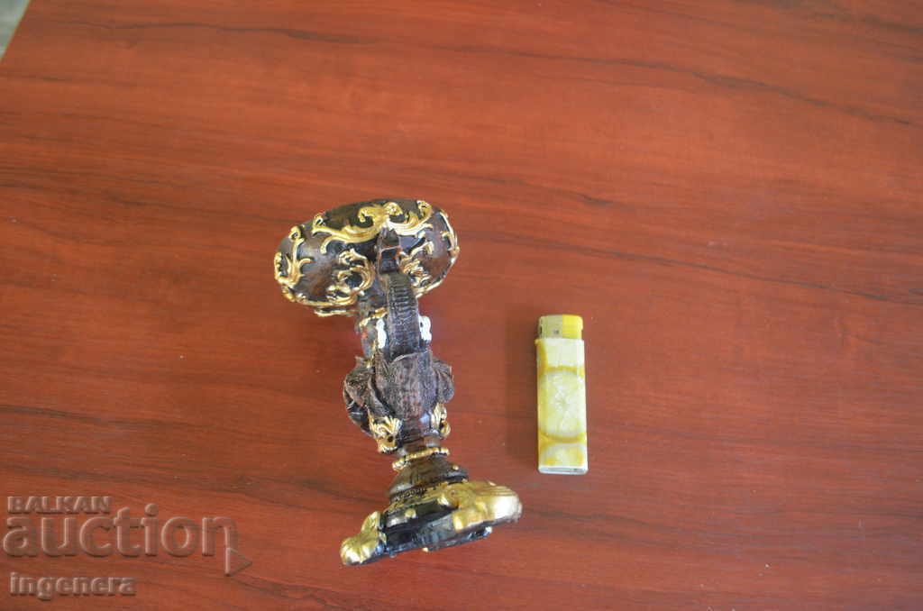 Auction  CANDLE HOLDER FOR A LARGE CANDLE