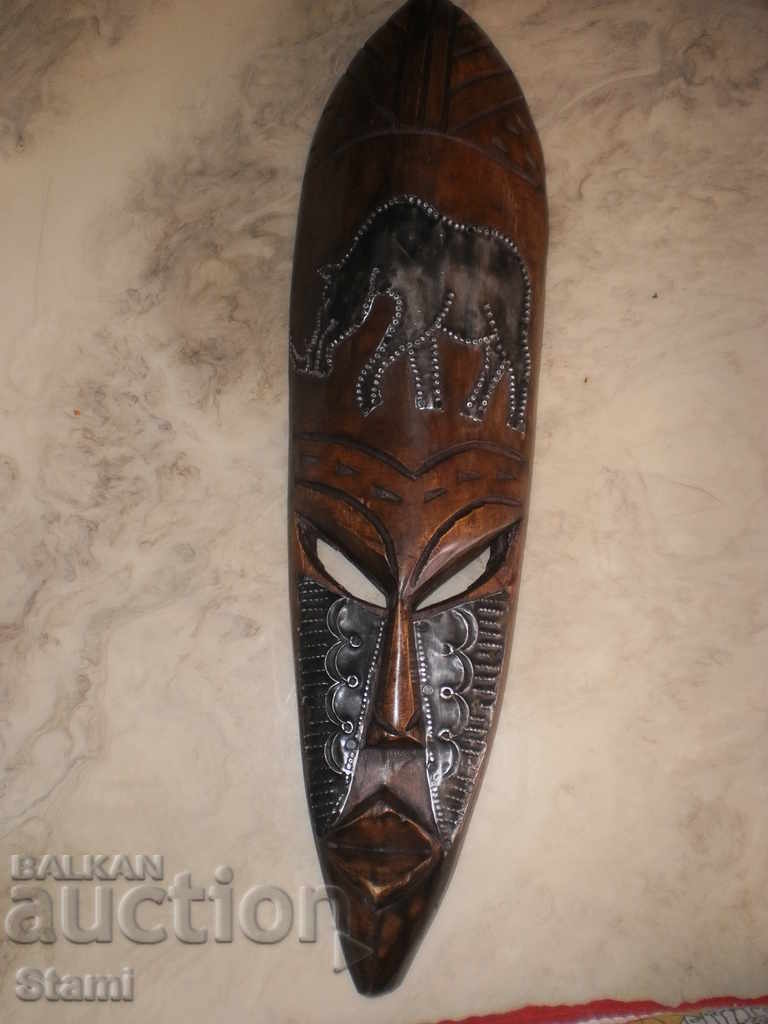 Auction A large African mask made of ebony and copper-12 + Auction A large African mask made of ebony and copper-12 +